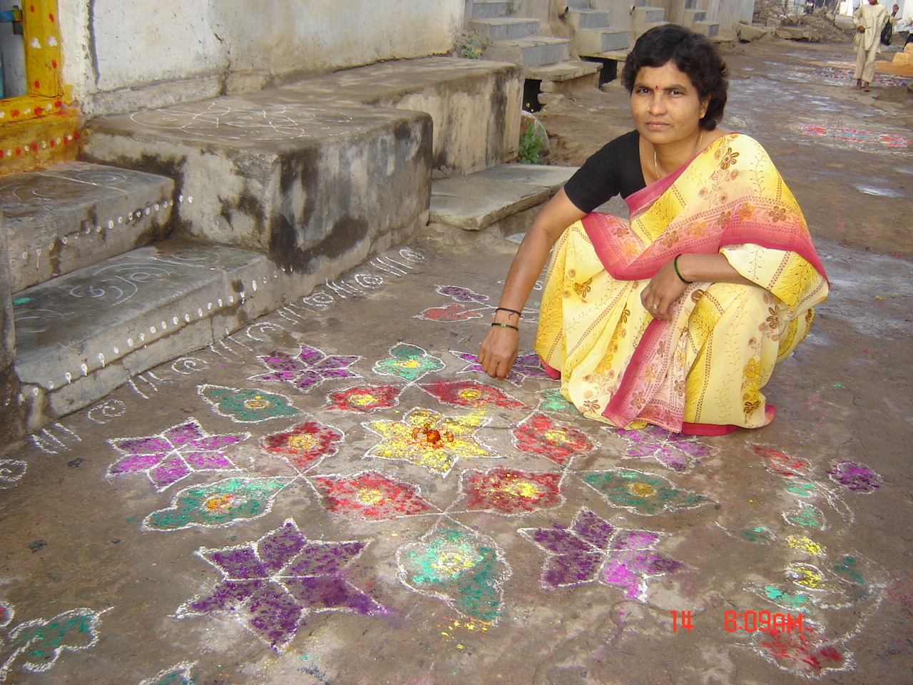Kolam drawn at temple doorstep